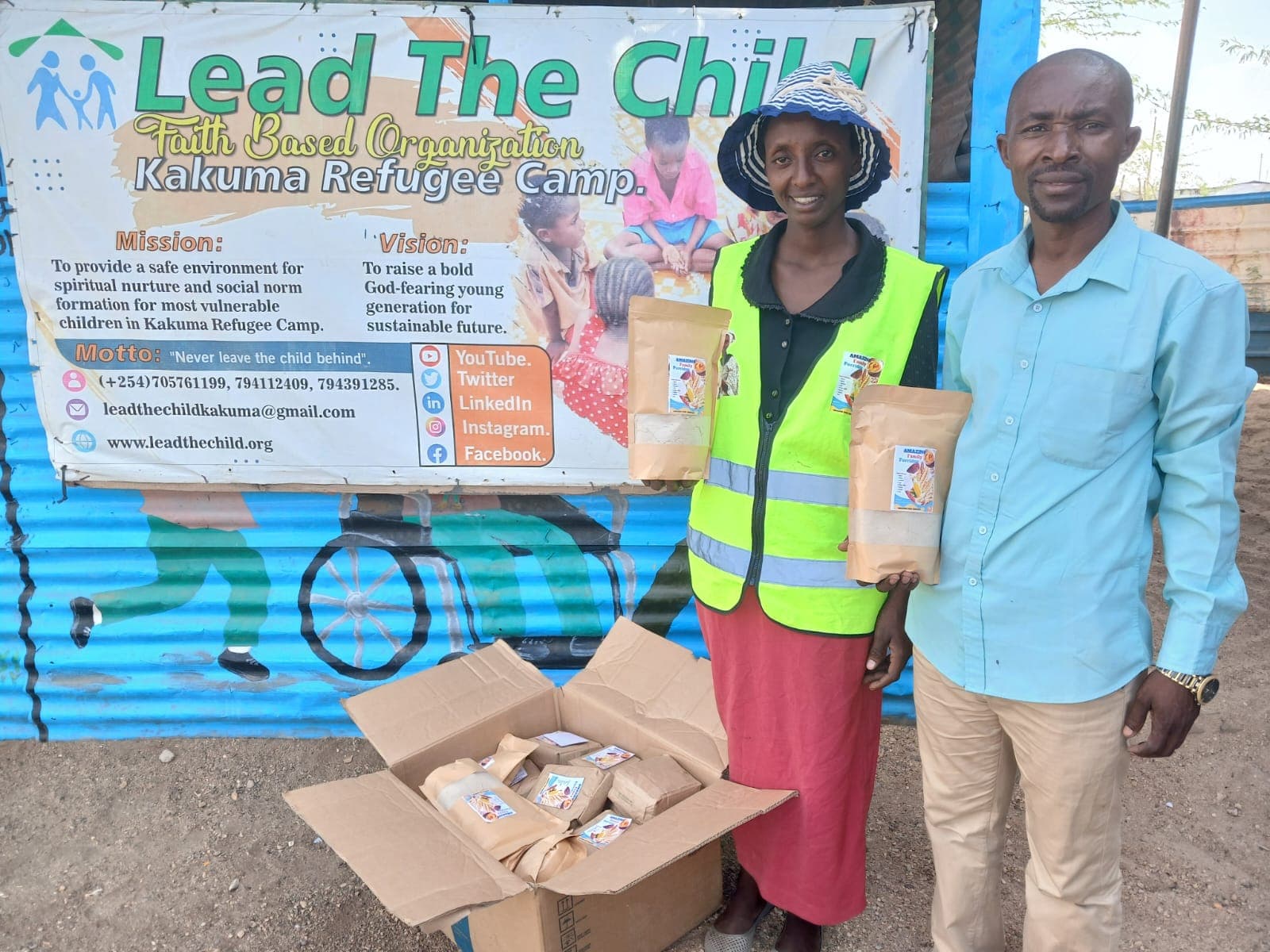 Pastor Ekabe and Fabiola delivering a porridge donation to Lead the Child orphanage